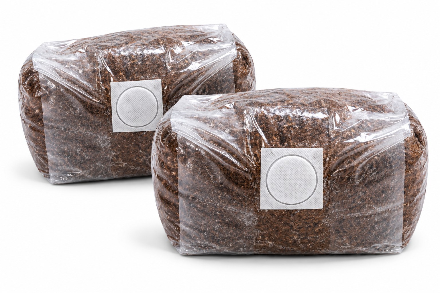 Two Turnbull Farms mushroom substrate bags on a clean white background